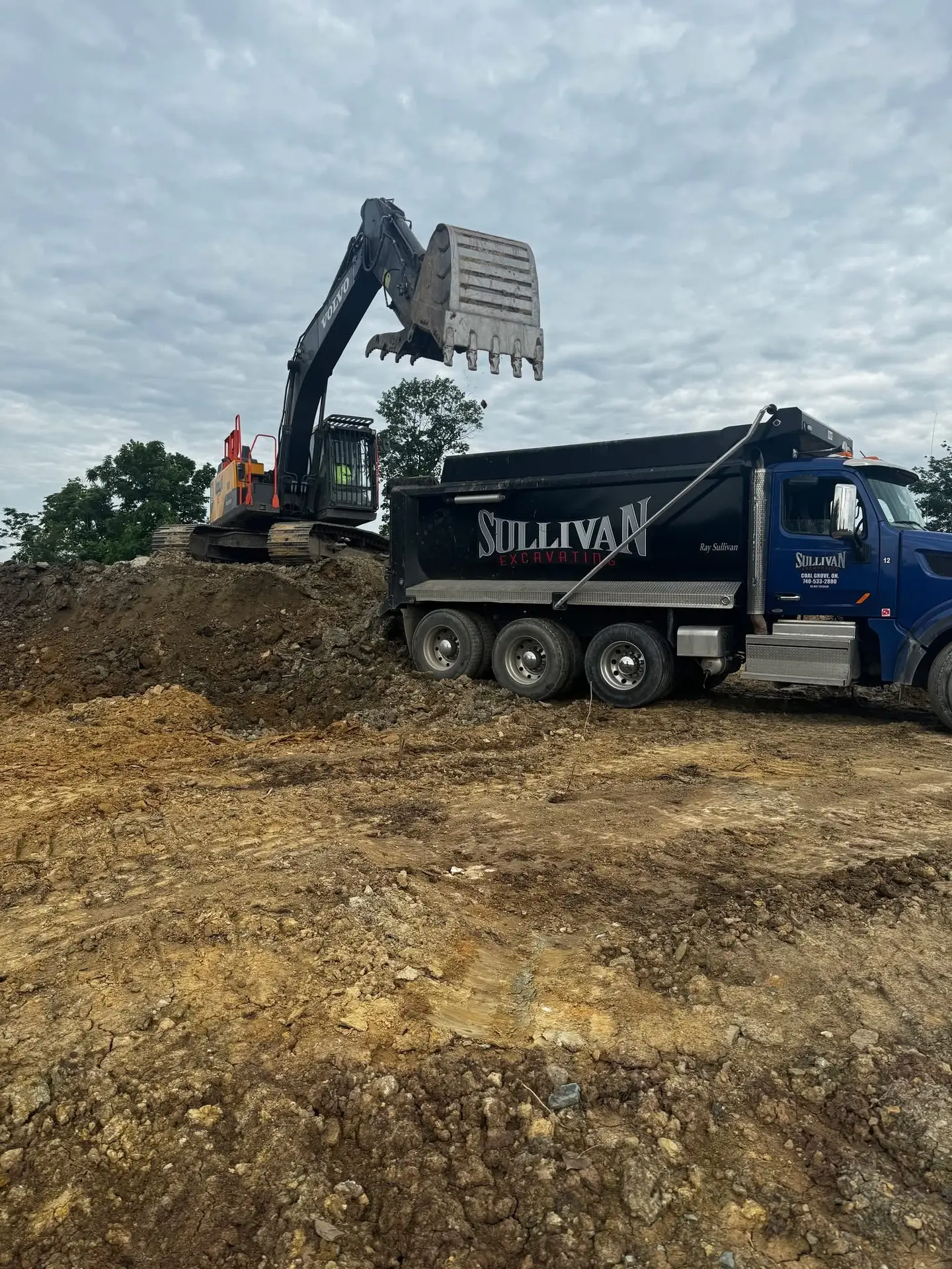 Excavation and site grading work in progress.