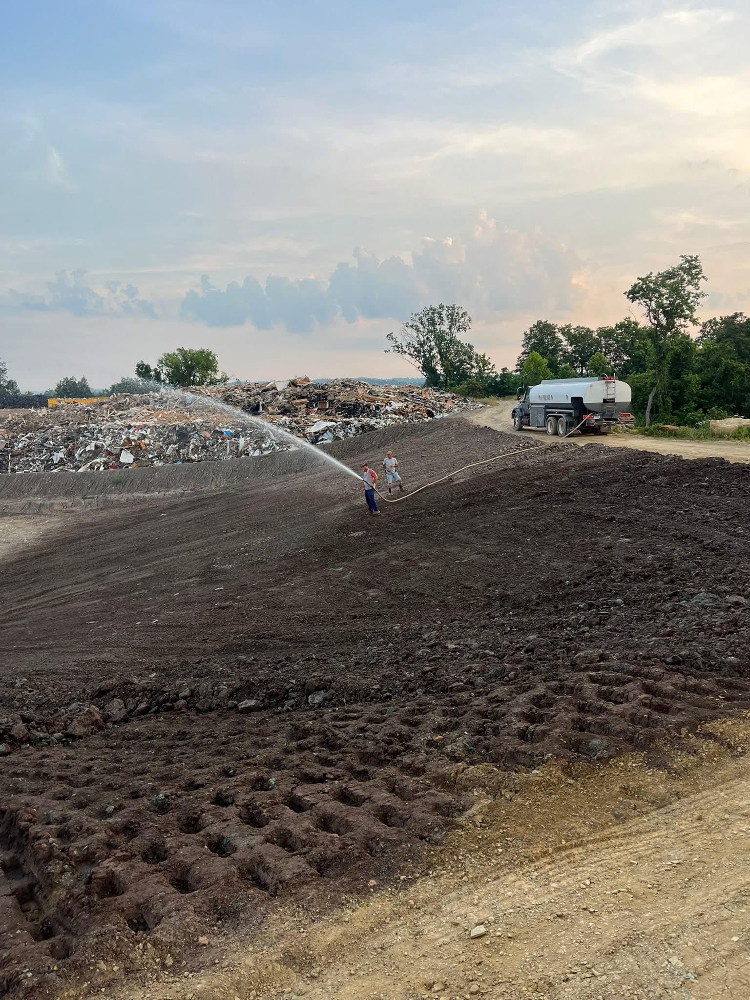 Landfill compactor spreading and compacting construction and demolition debris at Hilltop C&D Landfill in Lawrence County, Ohio.
